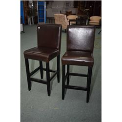 Pair of matching breakfast stool with faux leather covering