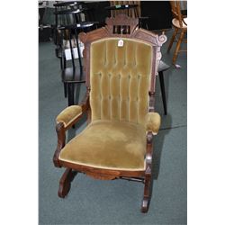 Antique Eastlake platform rocker with button tufted upholstery and open arms