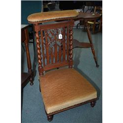 Antique velvet upholstered prie dieu chair with carved paneled back and barley twist supports