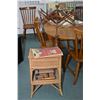 Image 1 : Floor standing wicker sewing box, scrap book of sewing samples, three wooden spools and a table moun