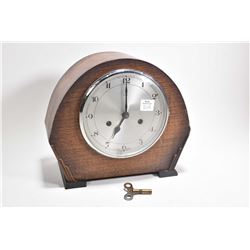 Antique chiming oak cased mantle clock made in England