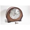 Image 1 : Antique chiming oak cased mantle clock made in England