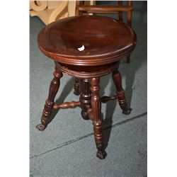 Antique adjustable piano stool with cast and glass ball and claw feet