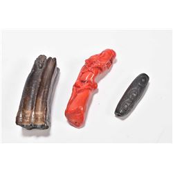 Selection of interesting collectibles including a red coral "dragon" pendant, a horn stamp and an as