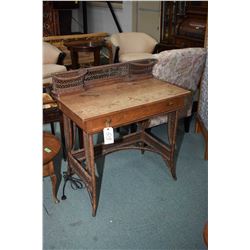 Quarter cut oak Mission style desk with wicker base and galley