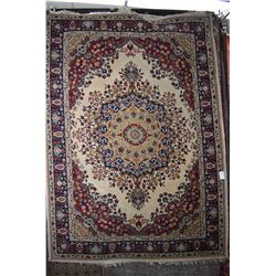 Vintage wool area rug with large center medallion and multiple borders, overall floral design on cre