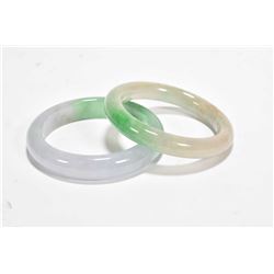 Pair of Burmese green and lavender jadeite bangles