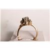 Image 2 : 14kt yellow and white gold diamond ring set with .40ct brilliant white round center diamond and .08c