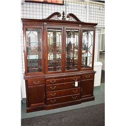 Large antique style chest on chest breakfront cabinet with illuminated display section made by Stanl