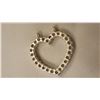 Image 4 : SPARKLING SKY BLUE TOPAZ HEART PENDANT.