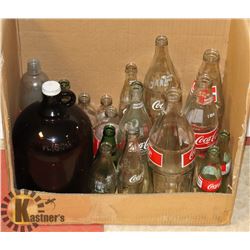 LOT OF COKE BOTTLES.