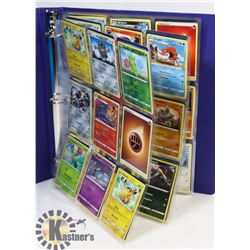 BINDER OF NEWLY OPENED 180 ASST POKEMON CARDS.