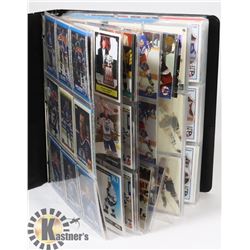 BLACK BINDER WITH VARIETY INSERTS & HOCKEY CARDS.