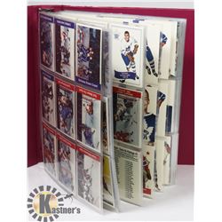 PINK BINDER WITH ASSORTED 1989-1992 HOCKEY CARDS,