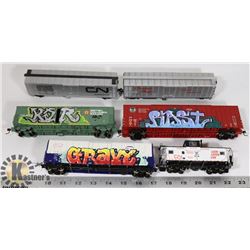 FLAT OF TOY TRAIN CARS.