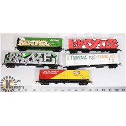 FLAT OF TOY TRAIN CARS.