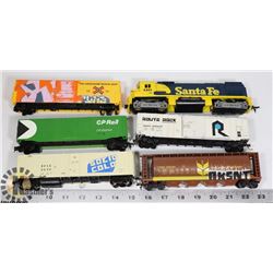 FLAT OF TOY TRAIN CARS.