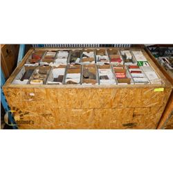 PALLET OF ASSORTED NEW CHAINSAW PARTS.