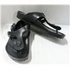 Image 1 : BIRKENSTOCK HARD BLACK PLASTIC SANDALS. SIZE L3