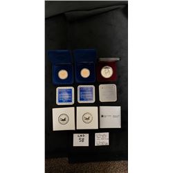 2 Canadian Royal Mint Coins 1987 loonies & 1 Canadian Royal Mint Coins 1988 Silver Dollar