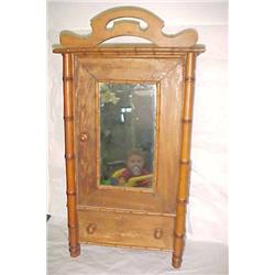 faux bamboo dolls armoire