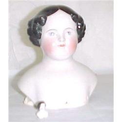 Lge. & small frozen charlotte doll head