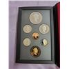Image 2 : 1996 7-piece Proof Set with McIntosh apple silver dollar. Five of the coins are Sterling Silver. All