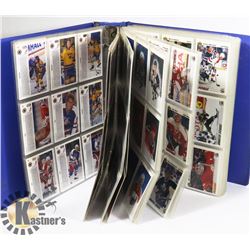 BINDER OF ASSORTED HOCKEY CARDS