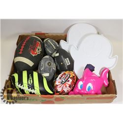 FLAT WITH SAND TOYS AND FOOTBALLS