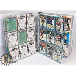 LOT OF 350+ HOCKEY CARDS IN BINDER.