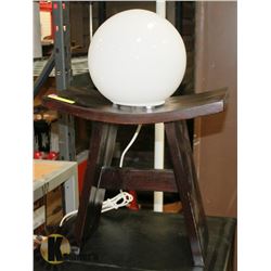 CURVED ESPRESSO END TABLE WITH ROUND WHITE LIGHT.