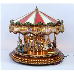 ORNATE LIGHT UP CAROUSEL DECORATION.