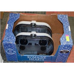 PAIR OF DESIGNER BY KRUGER TOILET PAPER HOLDERS