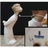 Image 1 : Lladro #4869  Boy Blowing  Height 7.7