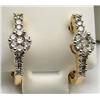 Image 1 : Round invisible set diamond earrings 1/