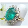 Image 1 : 7.12ct Emerald surrounded by 1.49ctw of