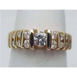 Diamond ring with channel set round dia