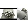 Image 1 : 3.00ct diamond with two .62ct side ston