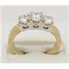 Image 1 : Ring three stone diamond center stone .