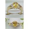 Image 1 : Lady's yellow sapphire ring with two tr