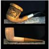 Image 1 : Two clay pipes, smoked one has a wolf a