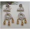 Image 1 : Diamond dangle earrings .33Ctw 14kt two