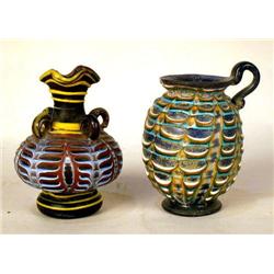 A VENETIAN GLASS PURPLE URN WITH TEAL BLUE ACCENTS