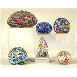 A GROUP OF FIVE MILLEFIORI PAPERWEIGHTS ALONG WITH AN EGG ON A PEDESTAL, 6"d