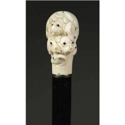 INTERESTING CARVED IVORY MULTI DOG HEAD