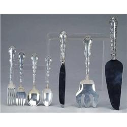 SIXTY-TWO PIECE LUNCHEON FLATWARE SET B