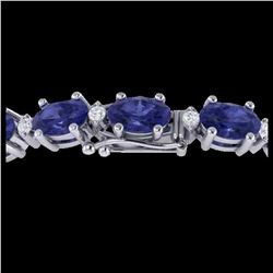 19.7 ctw Tanzanite & VS/SI Diamond Eternity Bracelet 10K White Gold