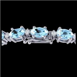 11.2 ctw Tanzanite & Diamond Halo Earrings 10K White Gold