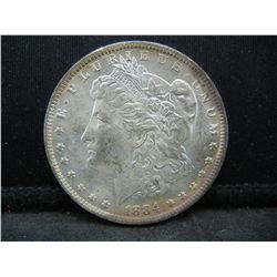 1884 O Morgan Dollar Crazy rainbow Toning reverse