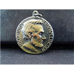 high relief Abraham Lincoln/ rotary club medal